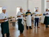 Professional camp chefs presenting freshly prepared dishes on the Salkantay trek