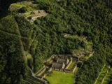 Aerial view of the Choquequirao complex showing terraces and stone structures on the ridge