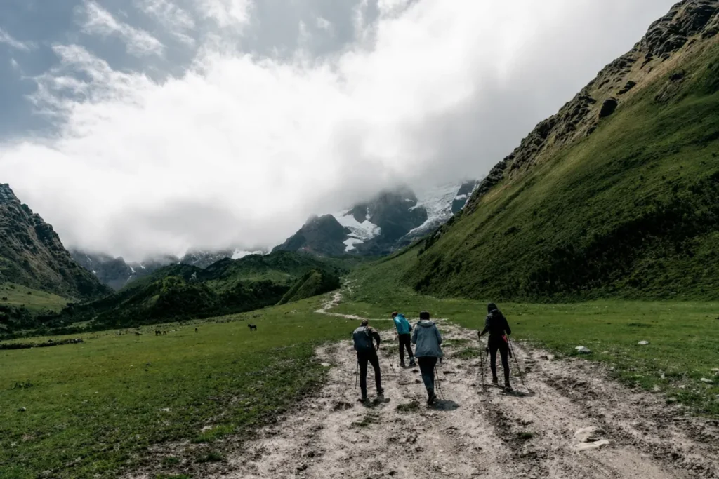 Hikers climbing the trail to Humantay Lake near Cusco