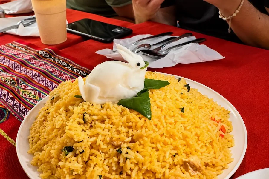 Yellow rice with a rabbit carved from a turnip, served at lunch on the Inca Trail