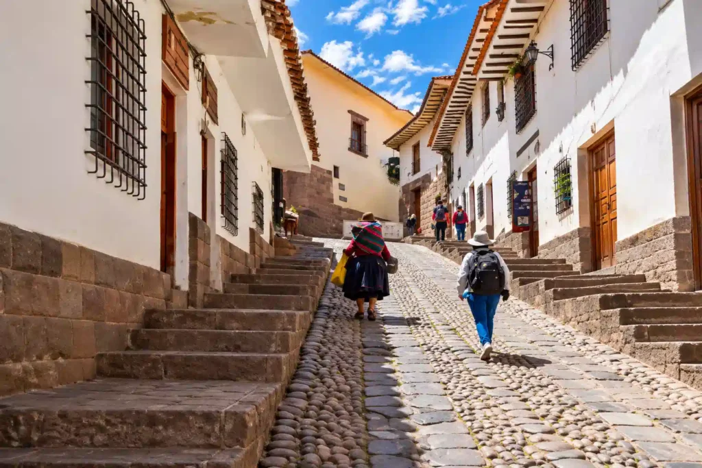 A cobblestone street in Cusco's historic center, a common stop for altitude acclimatization before Rainbow Mountain