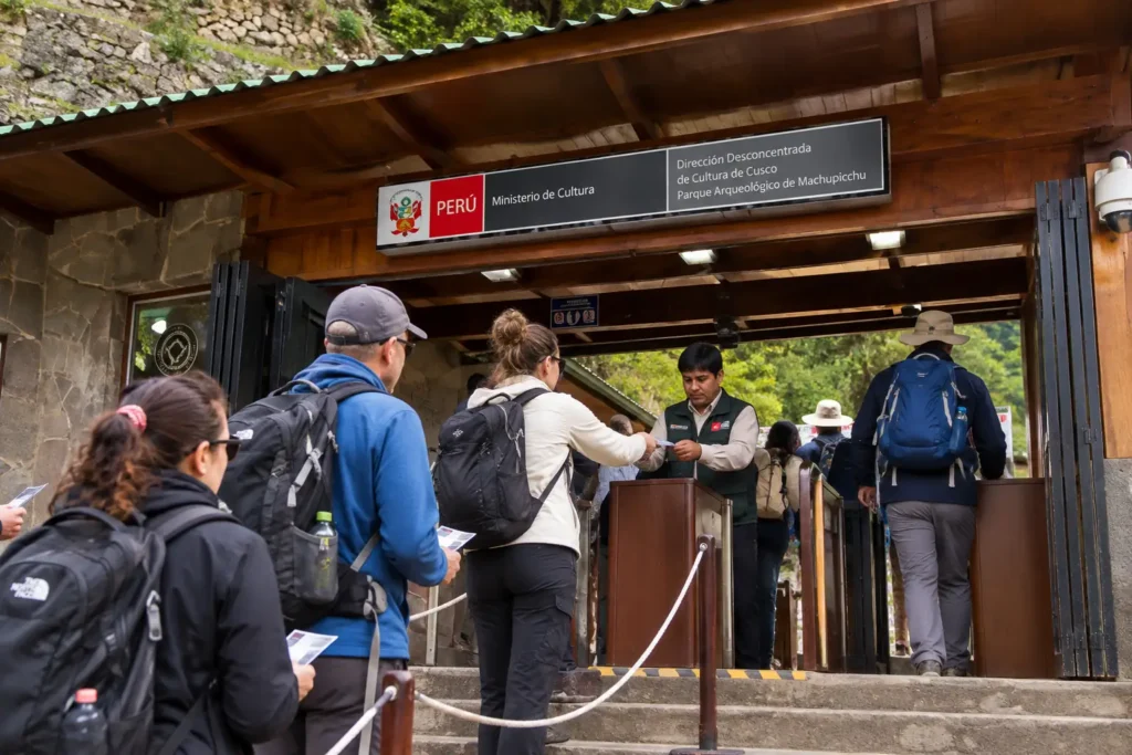 Machu Picchu entrance: visitors show their tickets at the main gate checkpoint