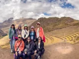 Travelers at the Inca terraces of Pisac in the Sacred Valley